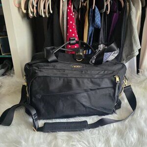 Tumi Black Duffel Bag with Gold Accents